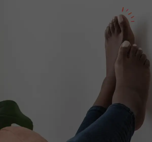 feet against a lounge wall